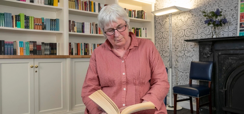 Centre founder Sarah Smyth seated in the reading room named in her honour.