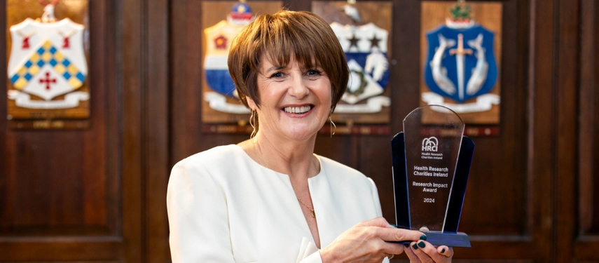 Mary McCarron with the HRCI research impact award