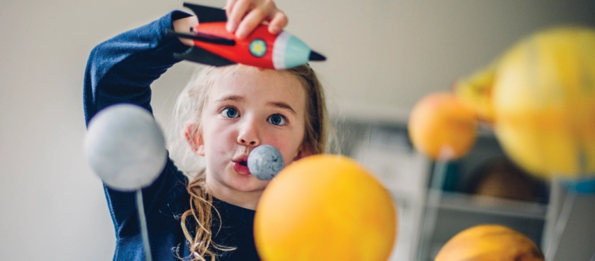 Child playing with rocket
