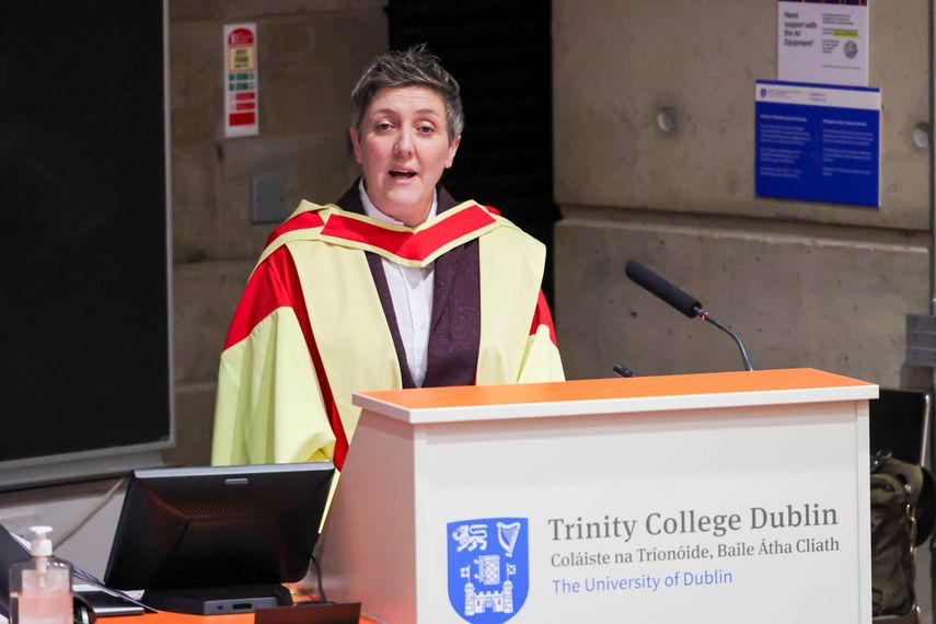 Woman at podium giving lecture