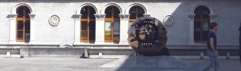 Museum Building with Pomodoro Sculpture