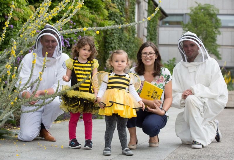 L to R, Beekeeper and SU President, Kevin Keane, busy bees Emilie and Molly, Professor in Botany at Trinity, Jane Stout, and Eoin Dillon, who is working with some of Trinity's researchers on a variety of urban bee projects.