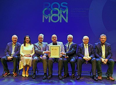 Dr John Bosco Conama at the Roscommon County Council civic reception with his award.
