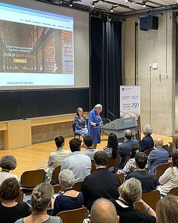 Image of Dean Carmel O'Sullivan (TCD) and Professor Corinna Salvadori Lonergan welcoming delegates to the Joint UCD TCD biennial conference of the Society for Italian Studies.
