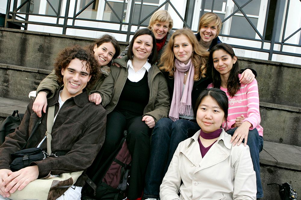 A group of students sitting together on campus
