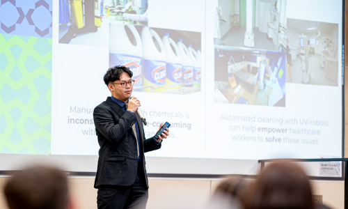 Laidlaw scholar speaking at an event from 2021