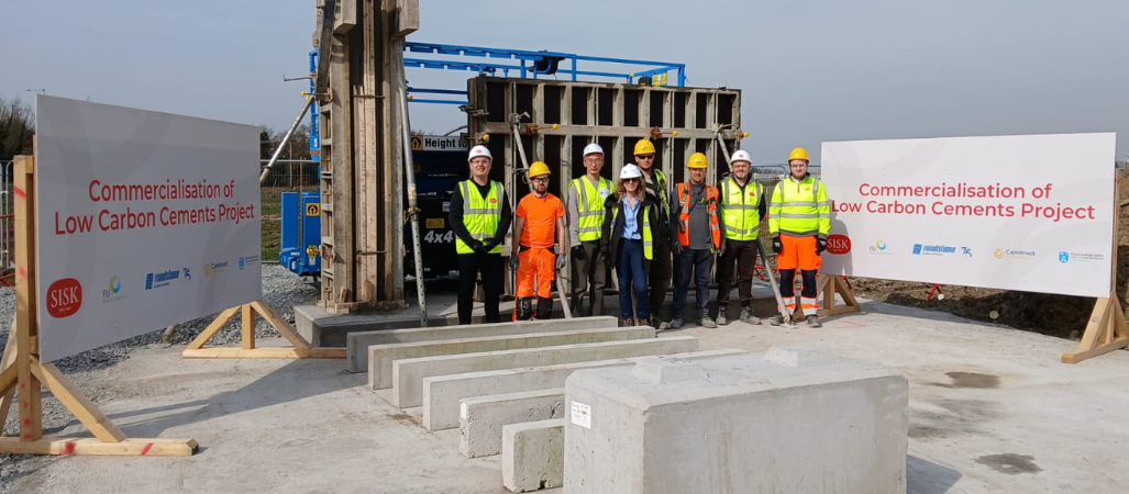 TCD, SISK, FLI and Roadstone personnel at the SISK’s site with a display of precast beams, Kelly blocks and ready-mixed concrete column and wall