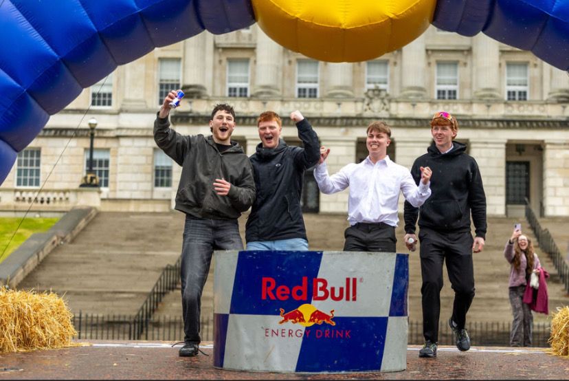 an image of the team on the podium