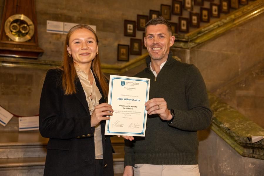 A photo of Zofia Wiktoria Jaros, winner of the E.R. Stuart Prize in Engineering and the Anita Newell Scholarships Second Place with Prof Monaghan