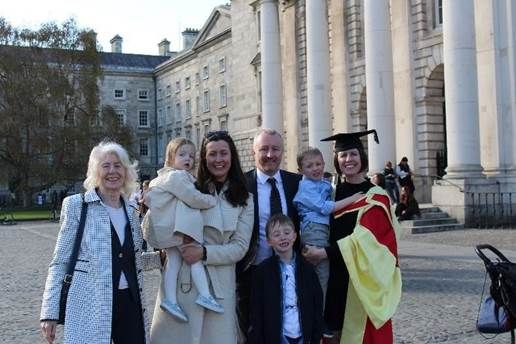 A family with children at a graduation