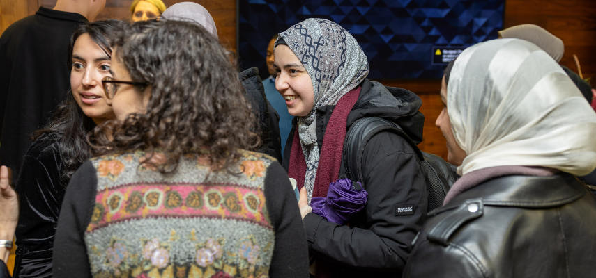 Young women in conversation at Dr Hoare's book launch.