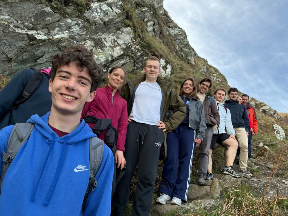 Group of student and academic walking around the cliff