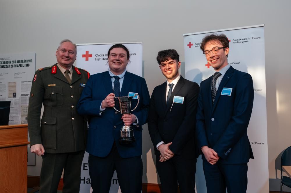 Pictured: Brigadier General Stephen Ryan with Winners Daragh Dunne (with the cup), Conor O'Dempsey and Conor Metcalfe
