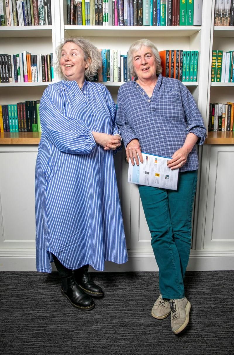 Provost Dr Linda Doyle and Sarah Smyth standing in the reading room of 36 Fenian Street.