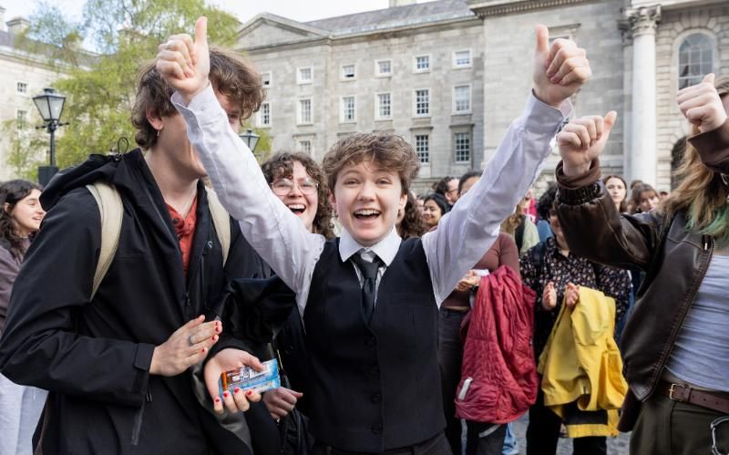 Emma Wilson, Law and History (TJH), gives a double thumbs-up after being announced as a new Scholar.