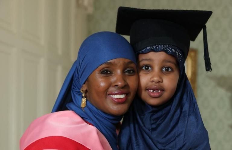 Mother and daughter in academic robes