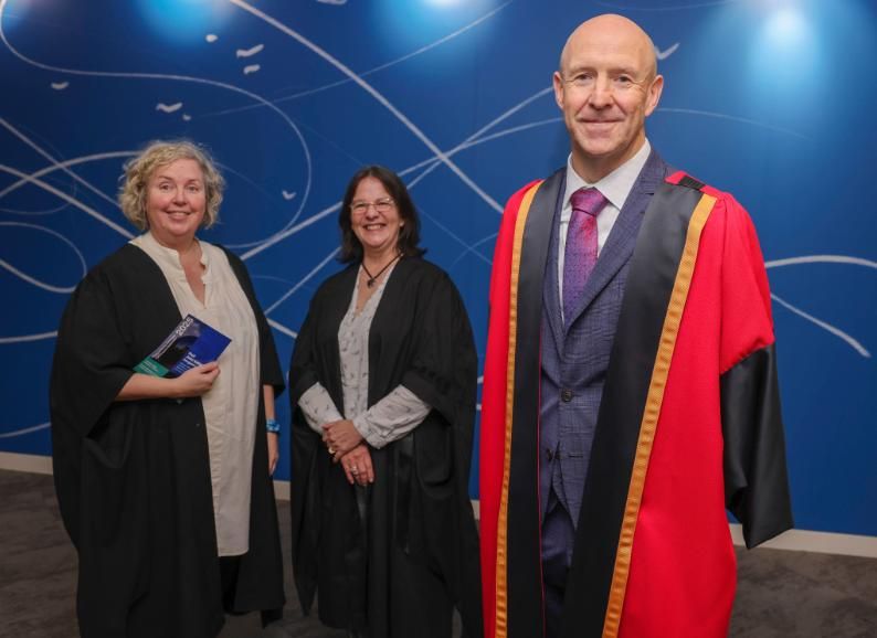 From left to right are Dr Linda Doyle, Provost of Trinity; Prof. Sylvia Draper, Dean of STEM, and Prof. John Kelleher, Chair of Computer Science and Director of the ADAPT Centre, wearing red ceremonial robes.