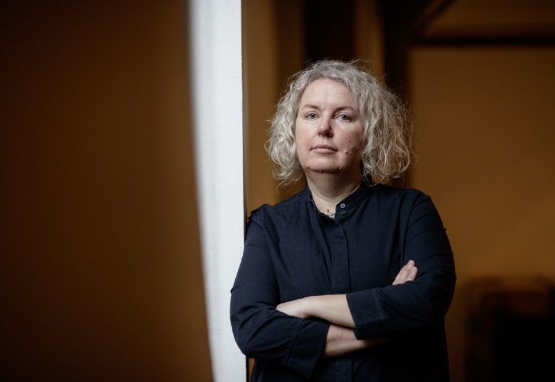 Portrait of a woman in a dark shirt