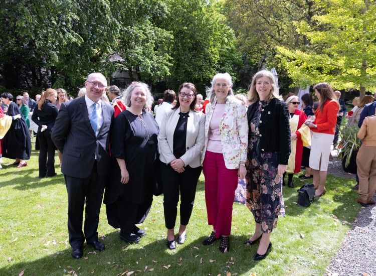 A group of people in a garden