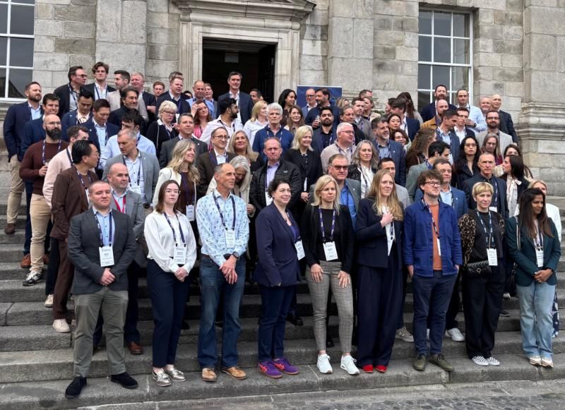 Researchers and key stakeholders in the KnEx-MedTech Innovator programme on the Dining Hall Steps in Trinity.