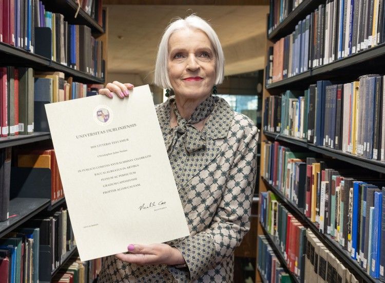 Woman holding a parchment