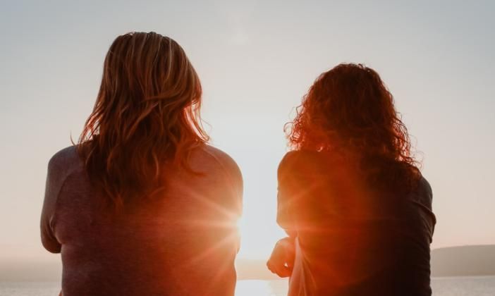 Silhouettes of two women
