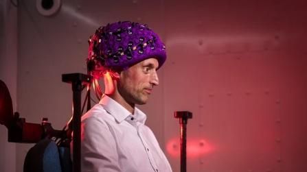 Redmond O'Connell wearing MEG helmet