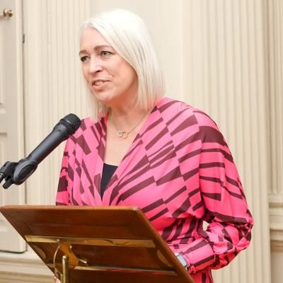 Michelle Tanner speaking at the FISU Gender Equality Award celebration at the Provost's House, November 2025