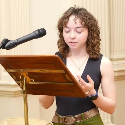 Katie Lynch speaking at the FISU Gender Equality Award celebration at the Provost's House, November 2025