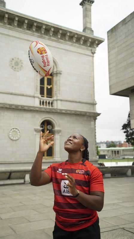 Linda Djougang in DUFC kit outside the Museum building and Eavan Boland, Trinity College Dublin