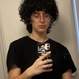Student with Black hair taking a selfie