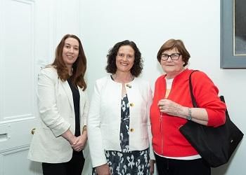 Three people at the  formally sign a Memorandum of Understanding (MoU) between the Trinity Centre for Ageing and the Life Course in Intellectual Disability (TCAID) and Avista