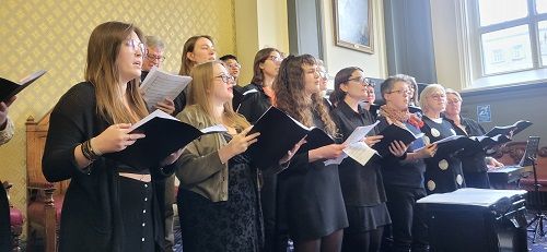 A choir singing at the launch of the Five Years of Public and Patient Involvement and Launch of National Impact Framework event
