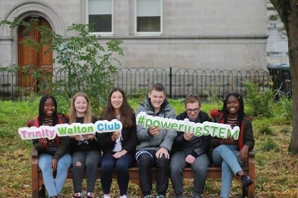 Walton Students holding signs